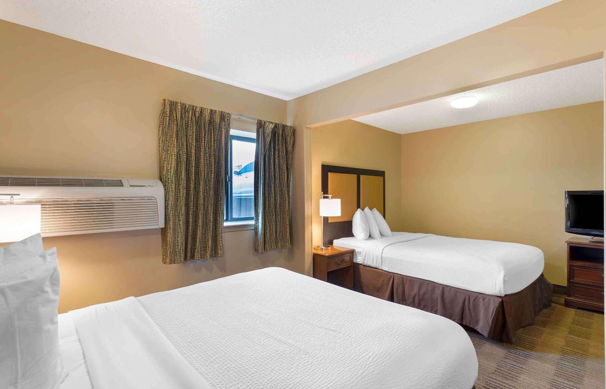 Extended America - - Westchase - Westheimer Houston